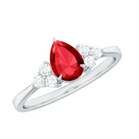 1 CT Pear Shaped Lab Grown Ruby Solitaire Ring with Diamond Trio