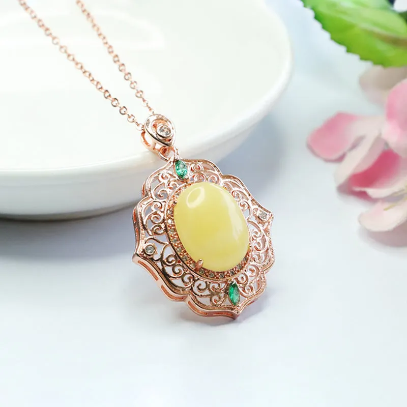 Amber Beeswax Pendant Necklace with Rose Gold Accents and Ethnic Influence