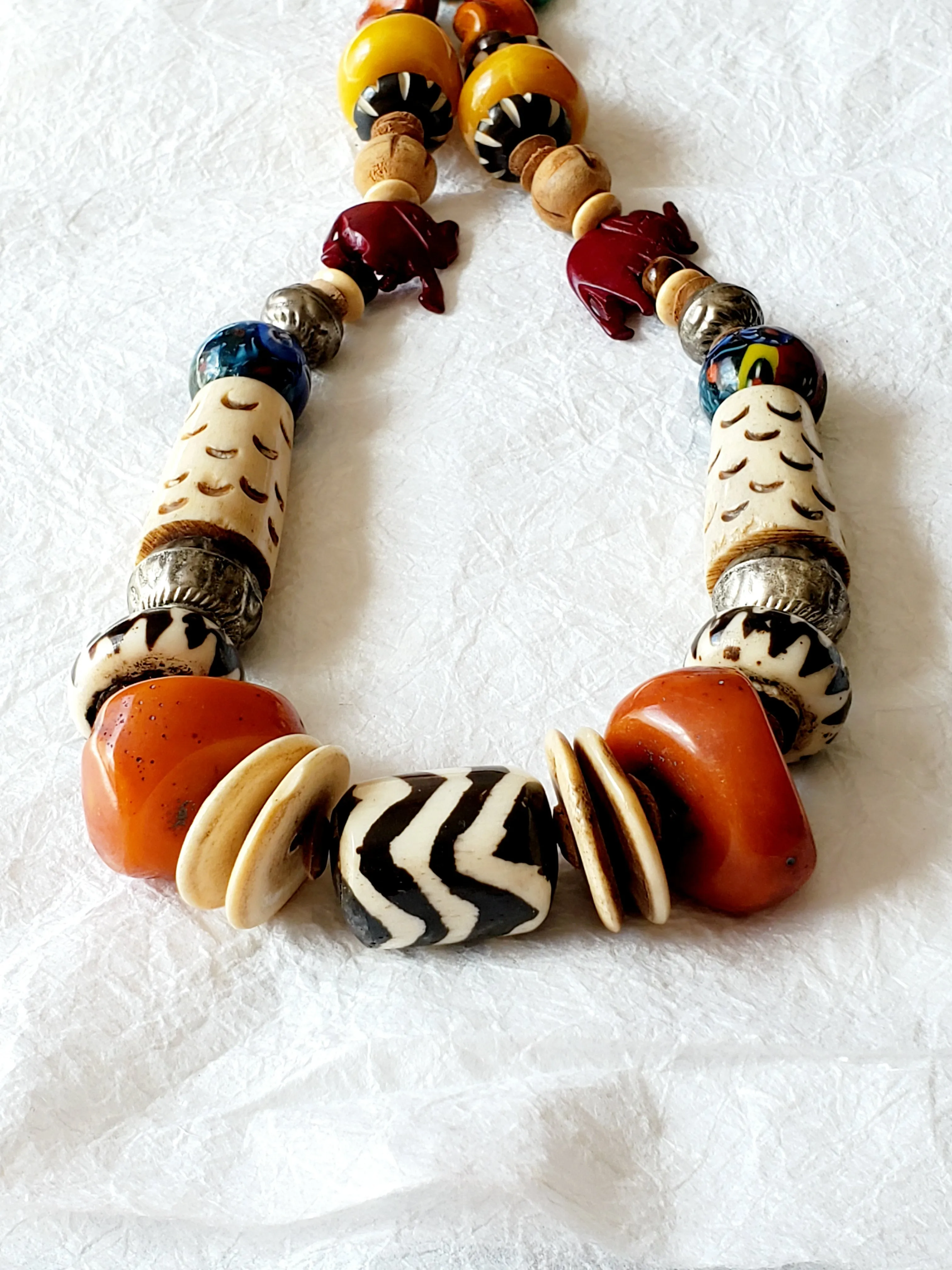 Carved Bone and Horn, Copal Amber Resin Batik Bone Lampwork Glass Elephant Casual Statement Necklace, The Juke Joint