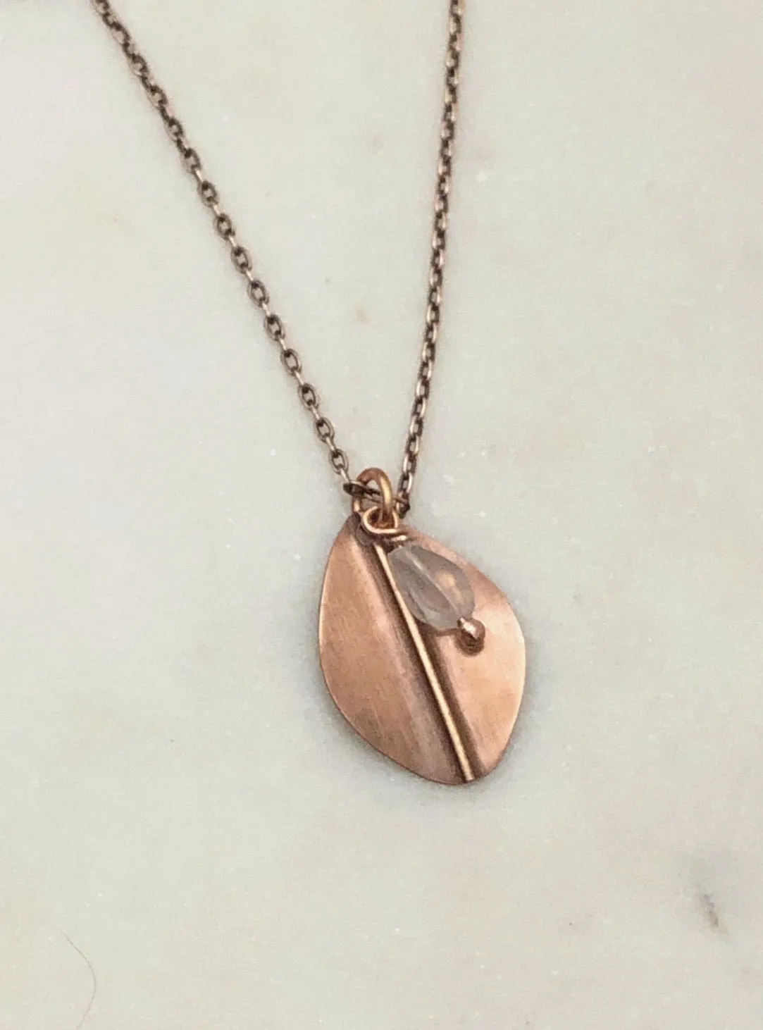 Forged copper leaf necklace with moonstone