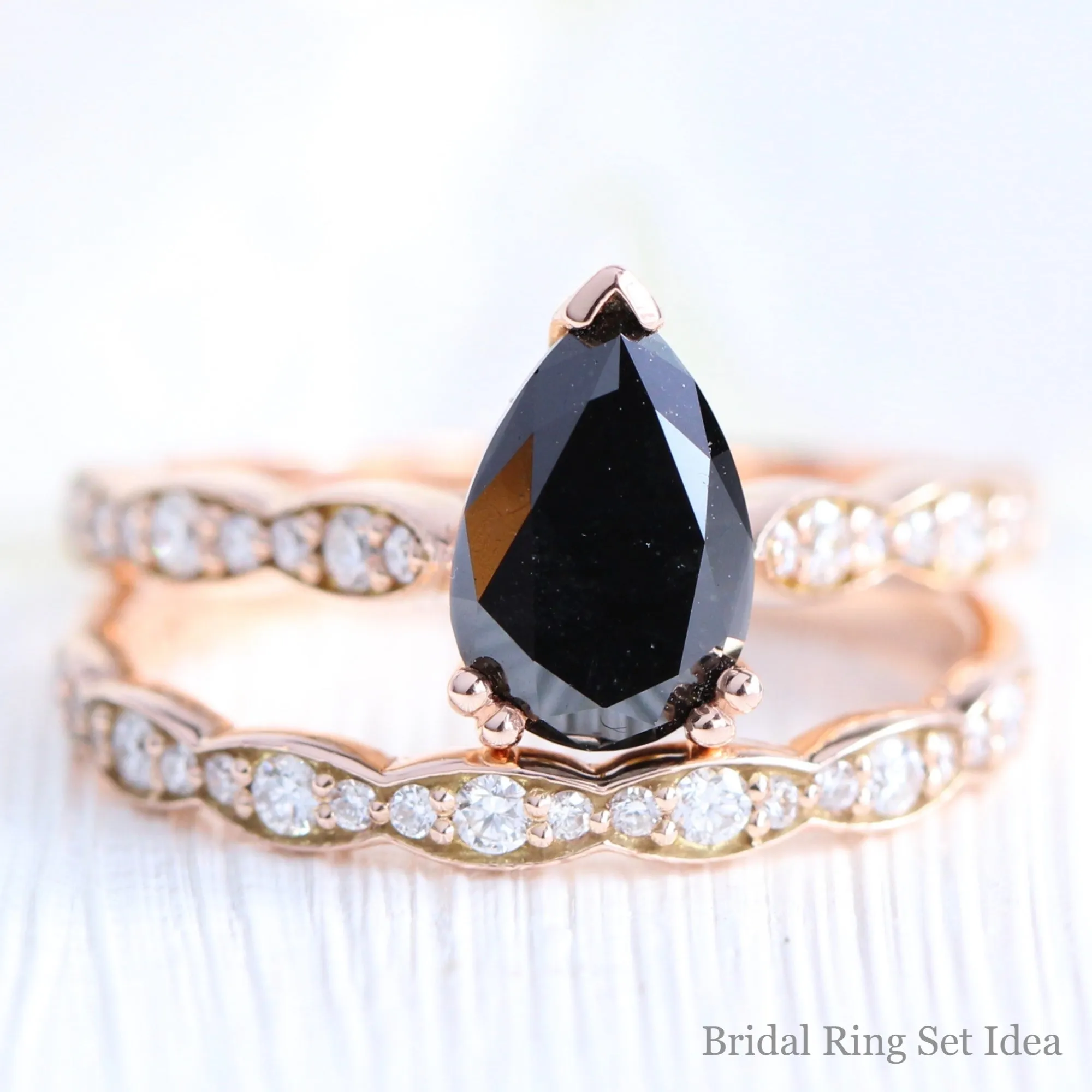 Pear Black Diamond Engagement Ring in Grace Solitaire Scalloped Band