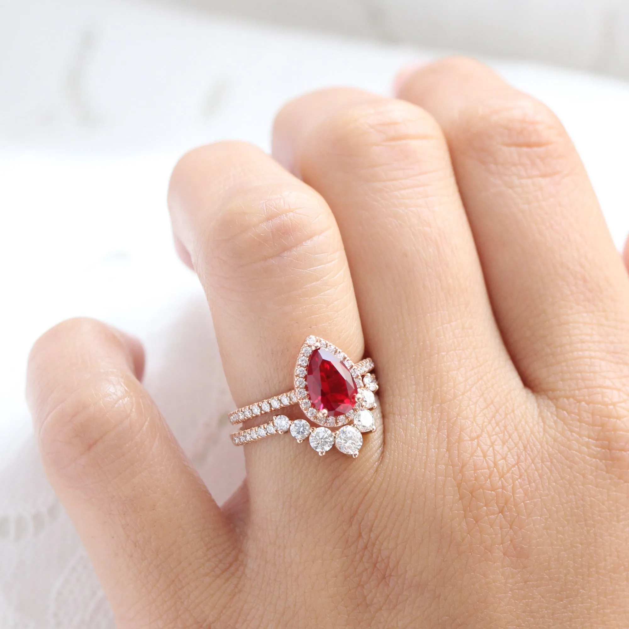 Pear Ruby Engagement Ring in Luna Halo Diamond Pave Band