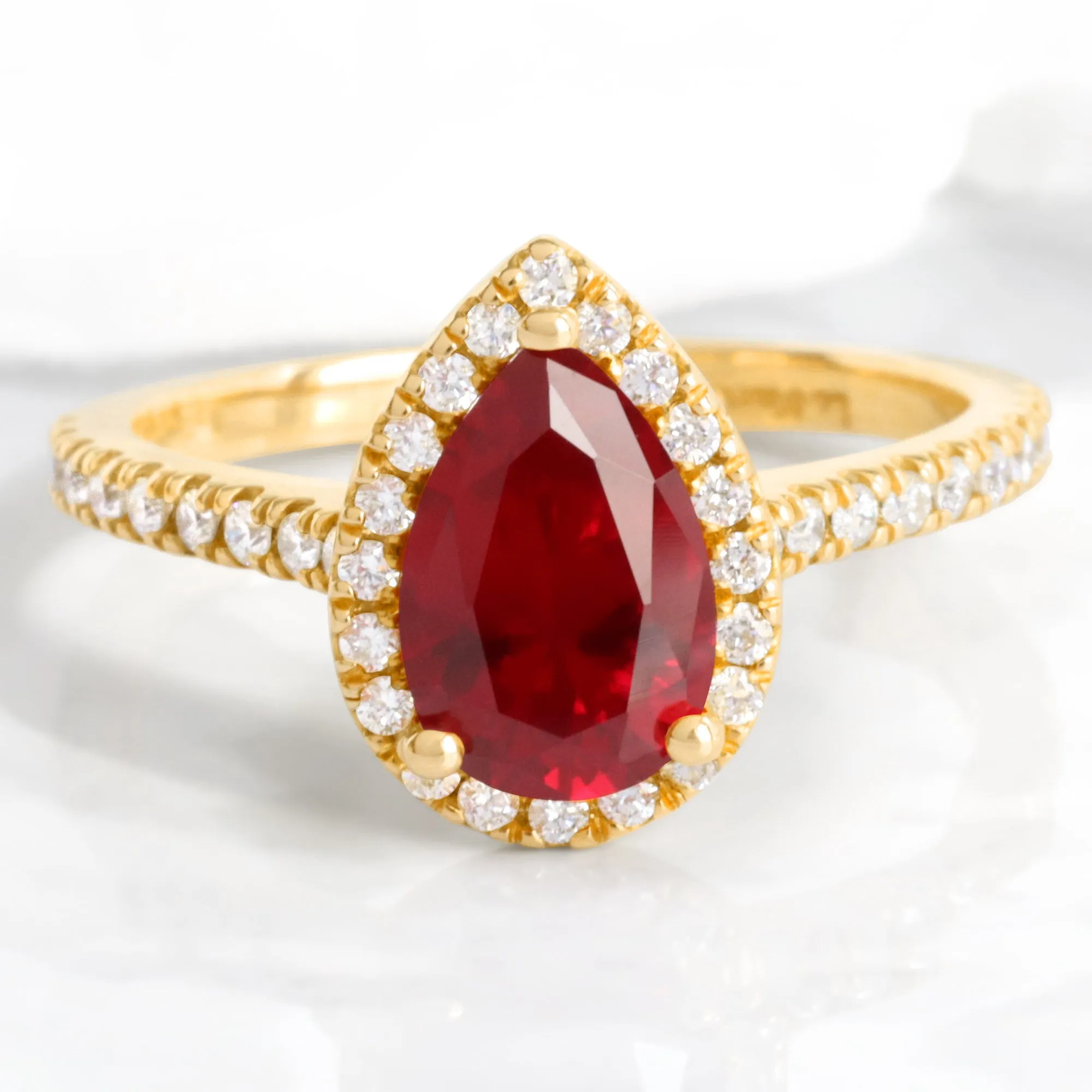 Pear Ruby Engagement Ring in Luna Halo Diamond Pave Band