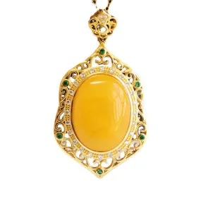 Sterling Silver Necklace with Amber Pendant and Green Zircon Detail