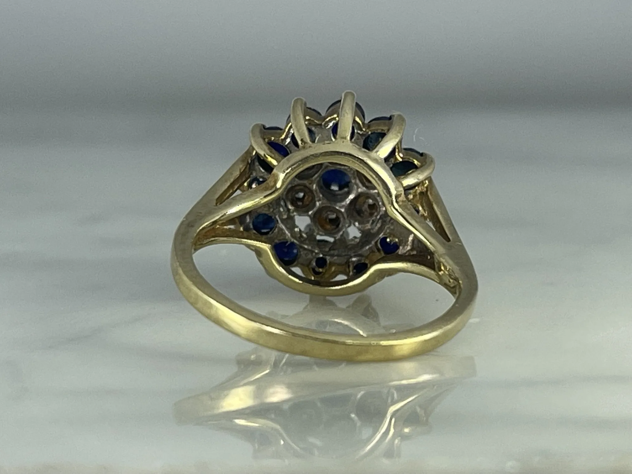 Vintage Sapphire and Diamond Halo Ring in Solid Yellow Gold. Unique Sustainable Estate Jewelry.